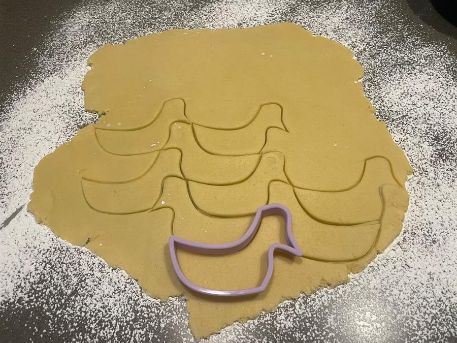Duck shapes cut from rolled cookie dough